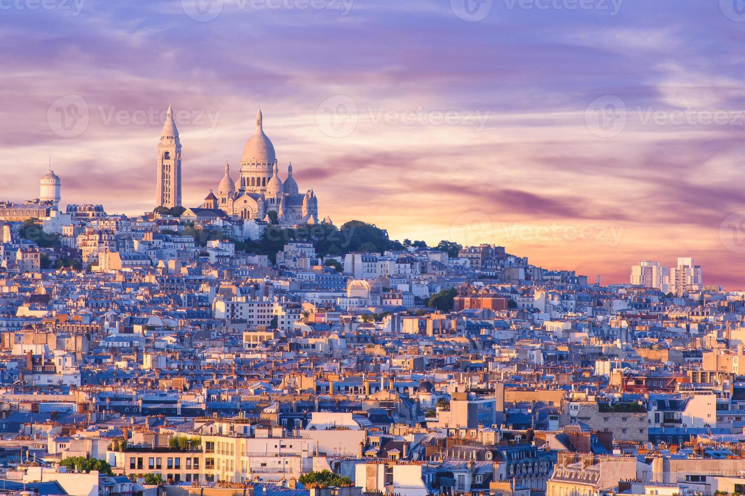 cityscape-of-paris-by-the-sunset-with-montmartre-hill-photo